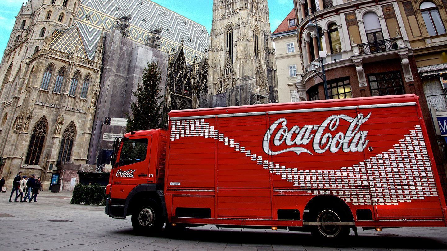 coca cola logo on tour bus