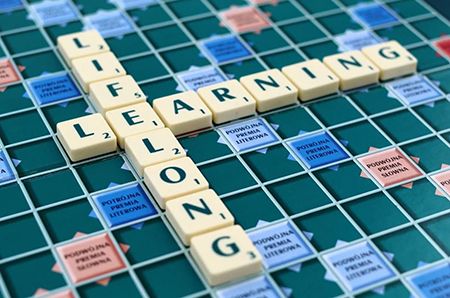 scrabble piecing spelling out lifelong