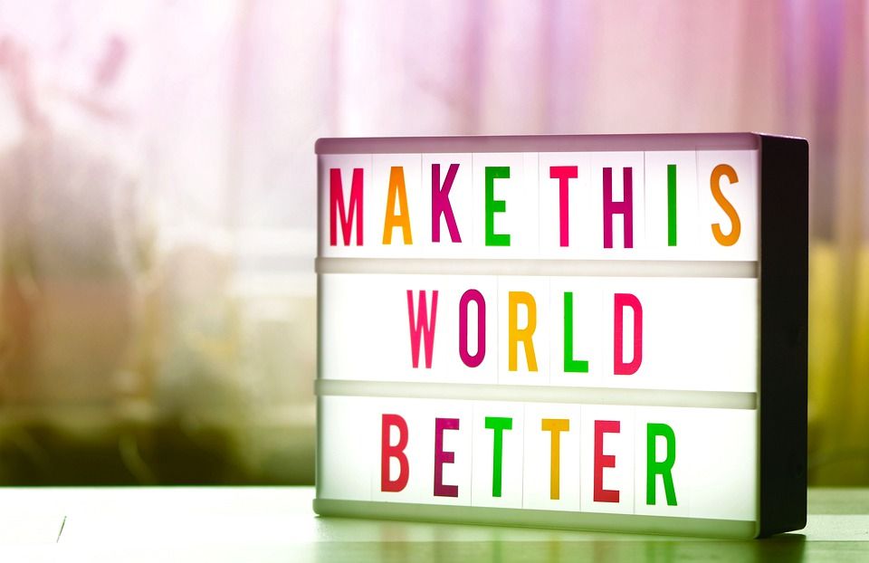 "Make this world better" sign
