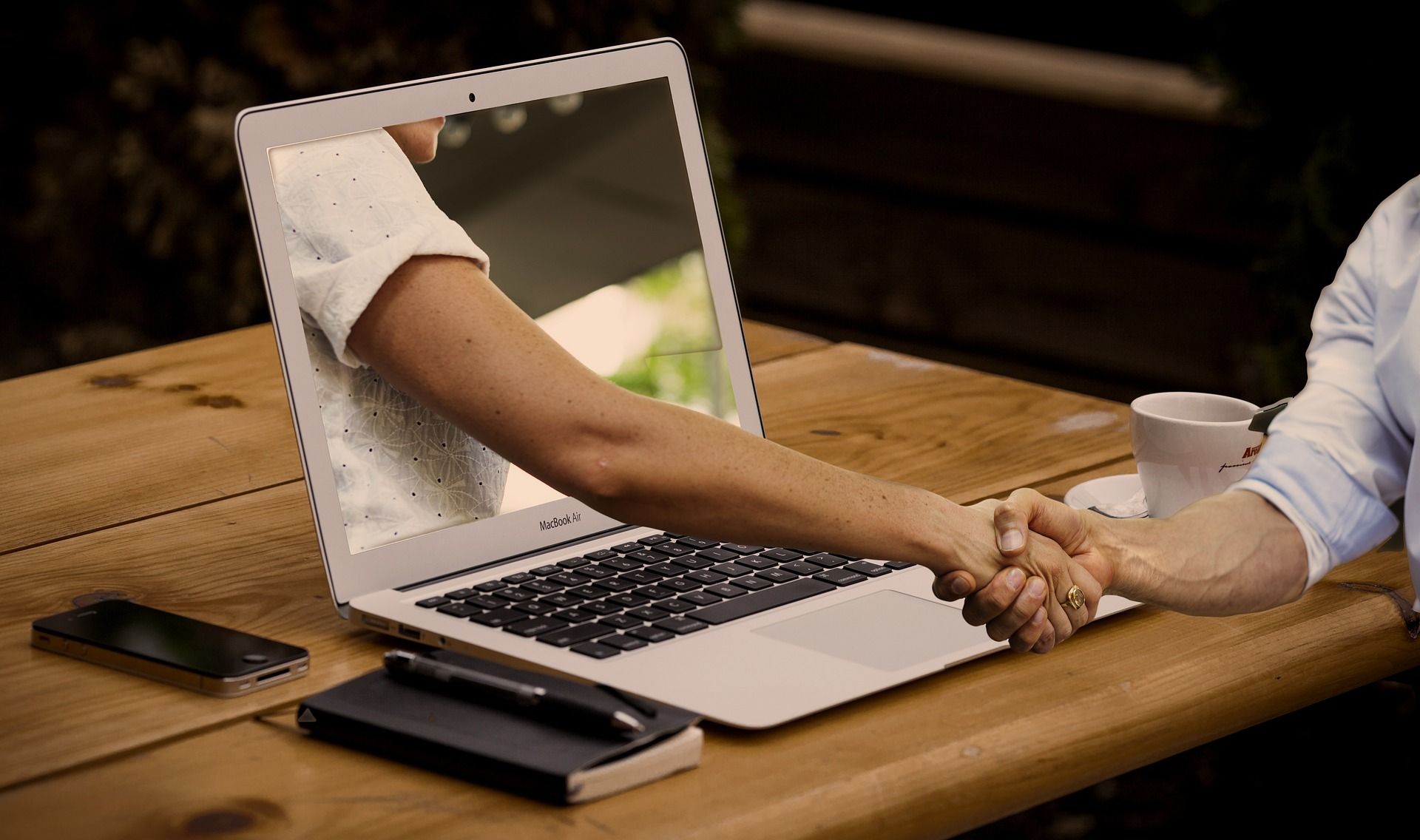 handshake through computer screen